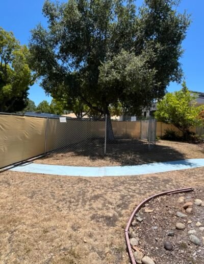 Temporary fence enclosing a residential yard